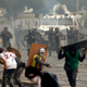 Bolivarian National Guards charge on anti-government demonstrators